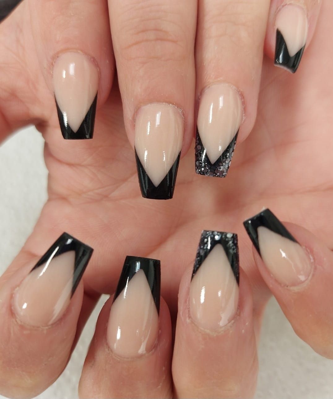 Nude acrylic nails with black V French tips